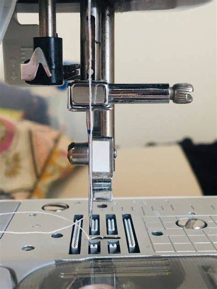Why does my needle keep unthreading on my sewing machine?
